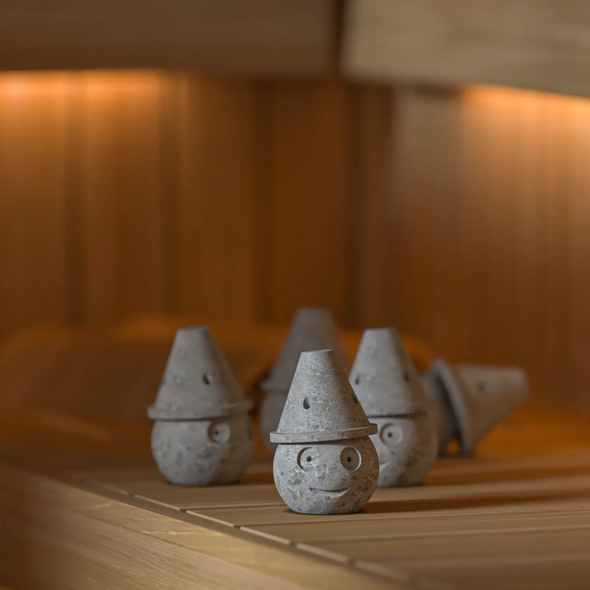 ถ้วย SAWO Kivistone Aroma Spirit Cup จัดวางบนม้านั่งซาวน่า