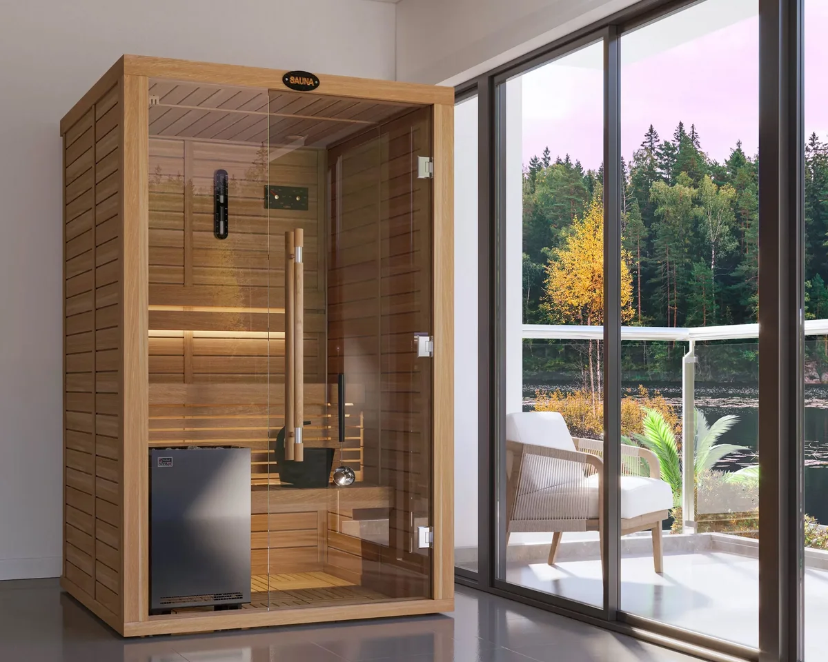 Glass-front SAWO sauna cabin on a terrace with a lake view